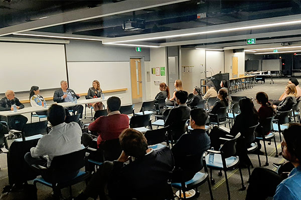 Attendees at Career Panel Event Listening to Speakers