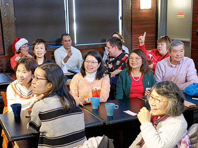 Attendees at Holiday Social