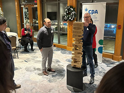 Participants playing giant jenga!