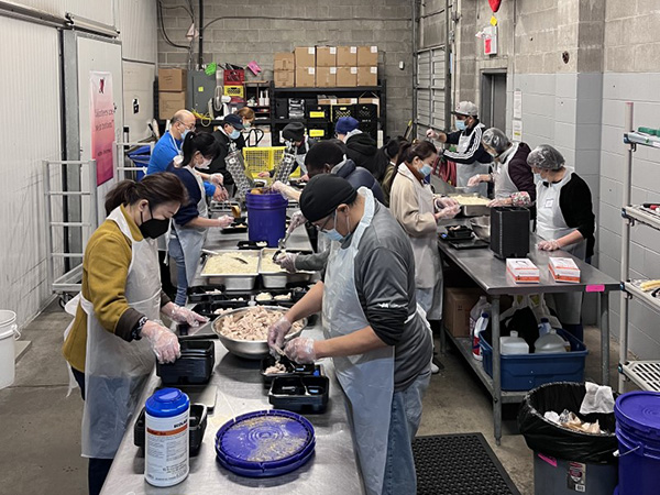  Chapter Volunteers Preparing food at A Loving Spoonful