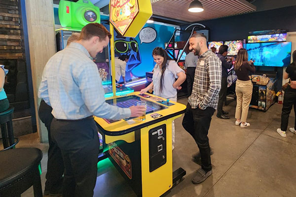 Attendees at Burgers, Brews and Arcade Fun